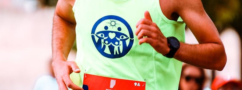 A person checking their fitness watch after a cardio session.